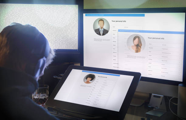 Hacker stealing your identity through personal information posted online